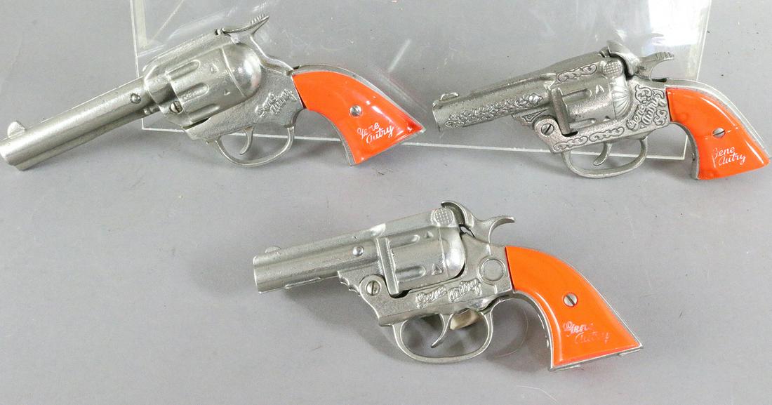 Kenton Gene Autry Cast Iron Cap Gun Lot: Kenton Gene Autry Cast Iron Cap Gun Lot