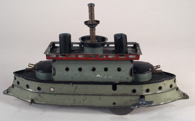 HESS Columbia Battleship Spanish American War: HESS German tin Columbia battleship, working clockwork, pre-war circa 1920s. Interesting design, modeled after Spanish American War battleships. Length approx. 6 inches. Good condition, paint intact w