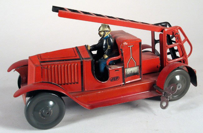 JEP (JOUET DE PARIS) (France) Fire Ladder Truck : JEP (JOUET DE PARIS) (France) fire ladder truck, working clockwork, pre-war circa 1930. Complete with figure and ladder. Attractive litho body and driver. Length is 7 inches. Uncommon example of small