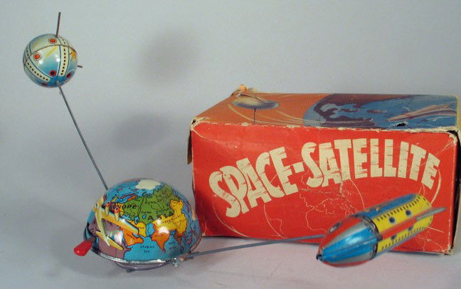 PN (NIEDERMEIER) Space Satellite Sputnik toy & Box: PN (NIEDERMEIER): "Space Satellite" sputnik toy with original box, working clockwork, circa 1960. Great post-war toy representing first Sputnik satellite launch. Detailed and attractive lithos, orbiti