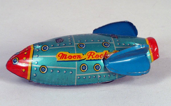 JAPAN: "Moon Rocket," most likely Sanyo, friction: JAPAN: "Moon Rocket," most likely Sanyo, friction powered, early 1950s. Attractive, small tin litho space rocket. Complete with fins. Fine condition. Another early Japan space toy ahead of the curve.