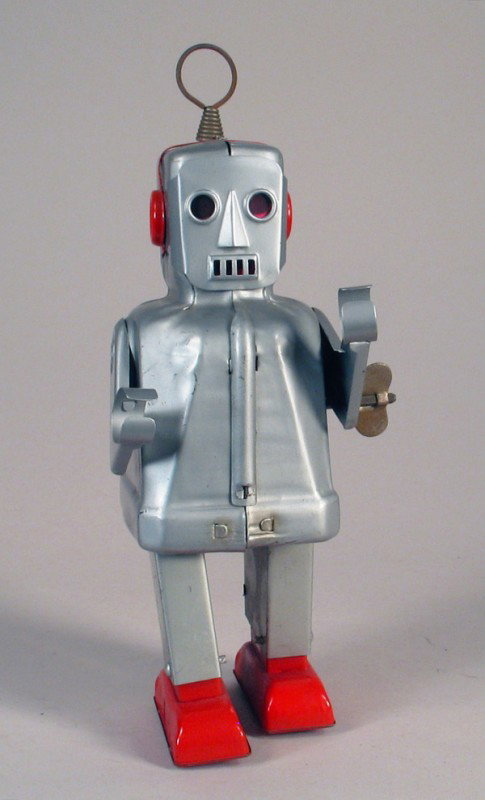 JAPAN-YOSHIYA: Sparky Robot Tin Windup: JAPAN-YOSHIYA: Spark Robot tin windup working, 8" tall. 1954 original classic clean lines robot in excellent bright condition.