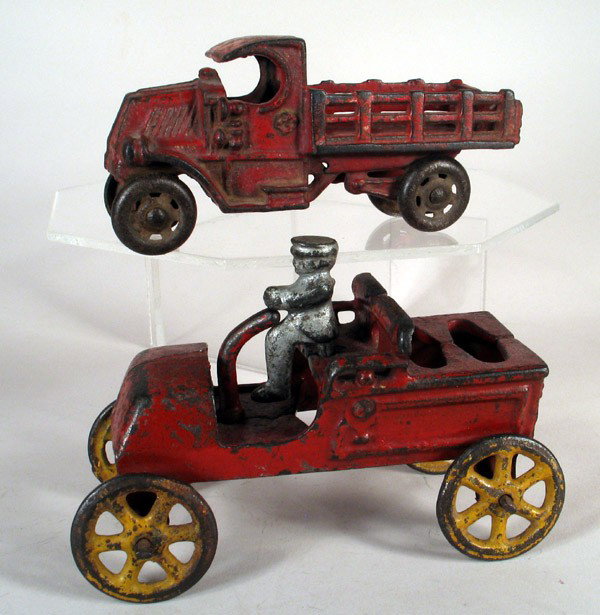 A.C. WILLIAMS & KENTON Auto & Mack Truck: A.C. WILLIAMS & KENTON Cast iron auto lot: Williams Mack truck, and early auto/truck with steering tiller, probably Kenton. Truck is 4 1/2 inches long, early auto is 5 inches. Original paint.