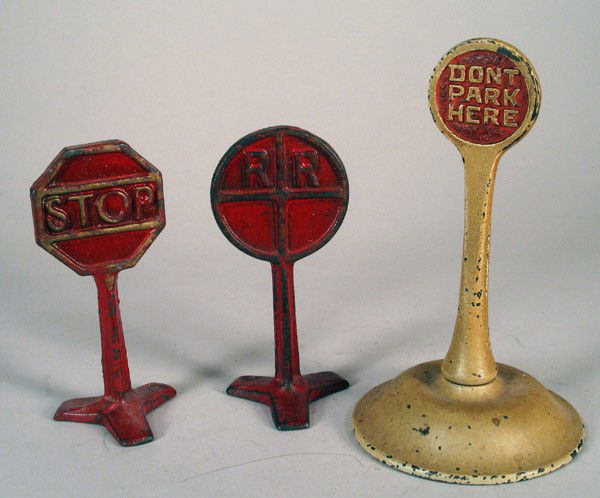 ARCADE: 3 Traffic Signs, Stop, RR & Don't Park: ARCADE Cast iron lot: 3 traffic signs, Stop, RR crossing, Don't Park Here. All in good condition, some wear to paint.