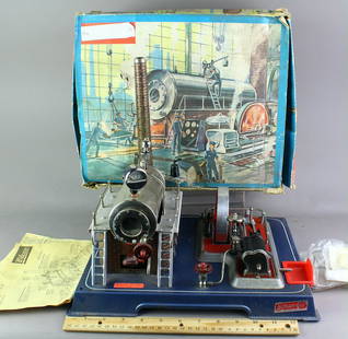 Wilesco German Tin Steam Engine in Box: Wilesco D-20 German Tin Steam Engine in Box with original papers and bag of parts.