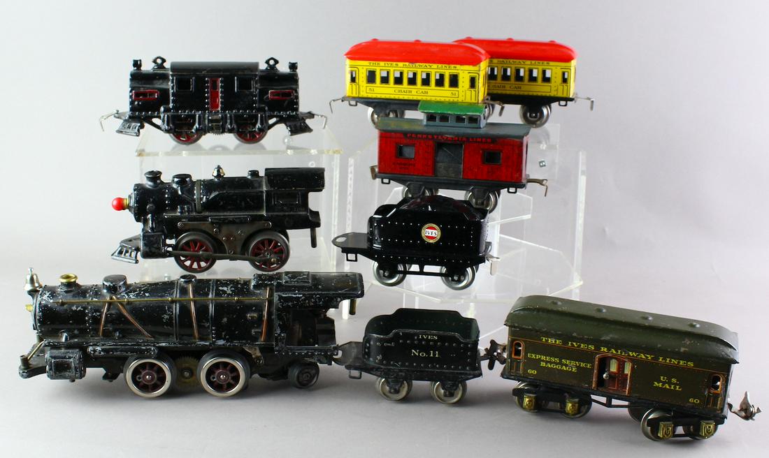Ives Cast Iron Steam Locomotives & Cars: Ives Cast Iron Steam Locomotives & Cars. Large engine has some damage in the rear. Lot sold as is.