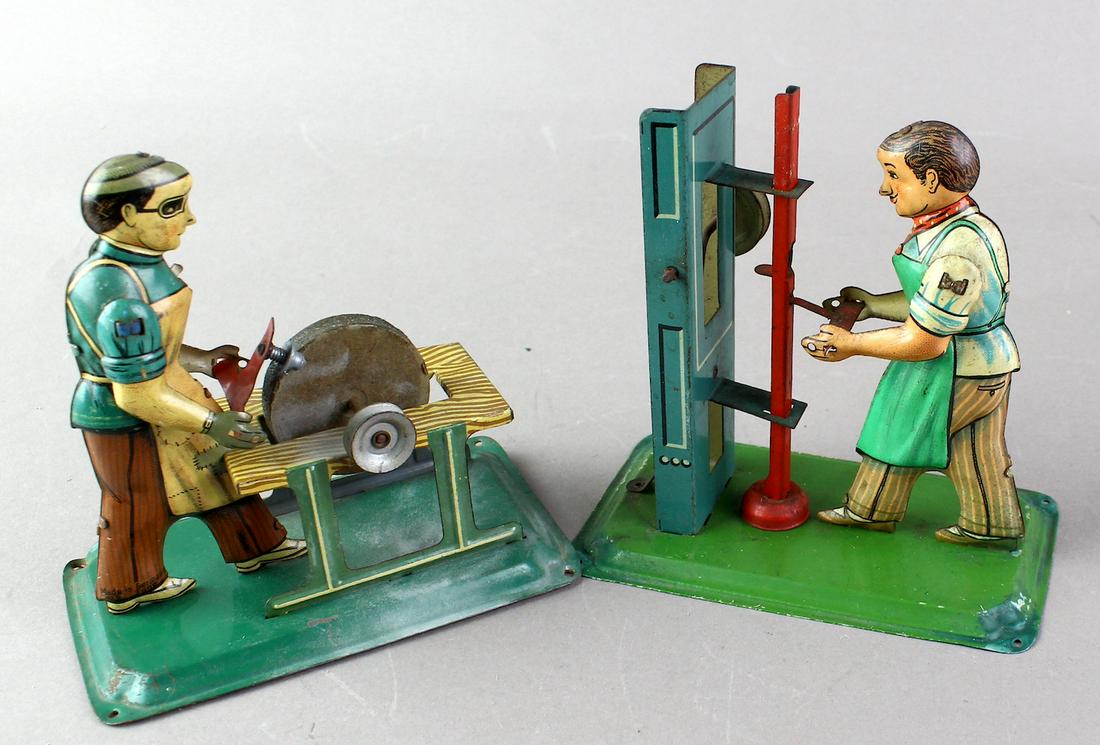 Arnold & Fleischmann German Steam Toys & Men: Arnold Men at Press and Sharpening stone, Fleischmann Sausage maker, Bing wheel set, and other German Steam Toys.