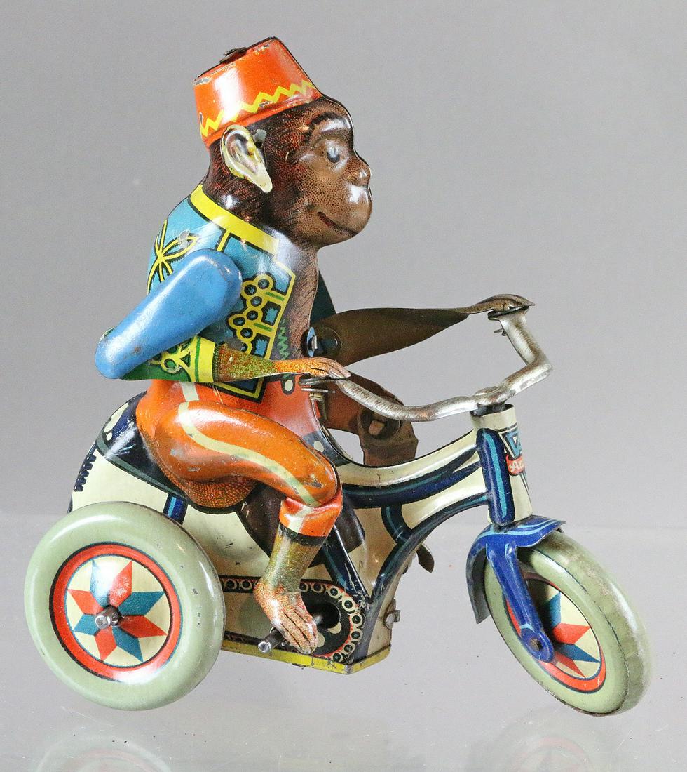 Arnold Monkey On Motorbike: Arnold German tin Monkey on Motorbike, 4 inches