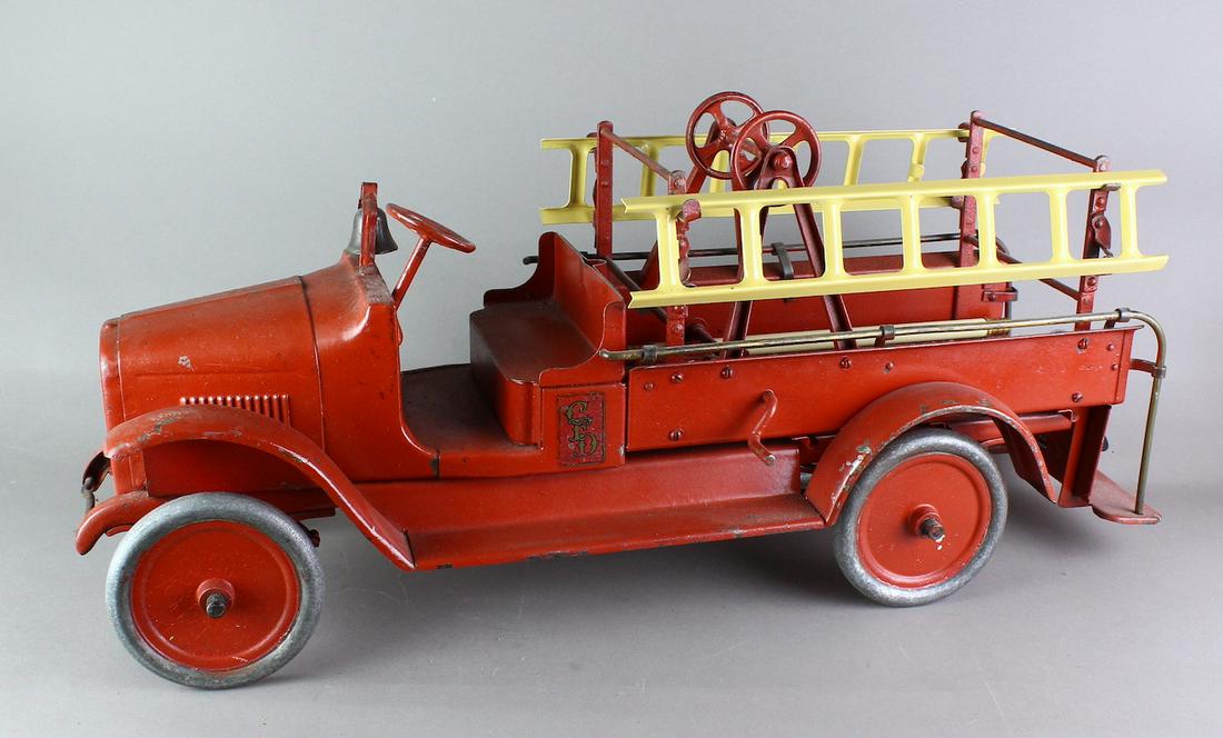 Buddy L Ladder Fire Truck: Buddy L Fire Ladder Truck. Good sound truck with old repaint, 25 inches long.