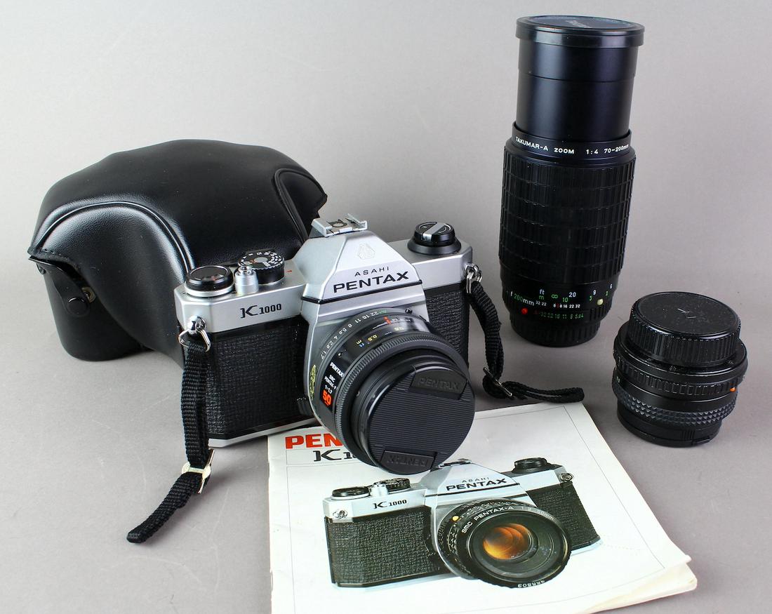 Pentax K1000 35mm Camera & Lenses: Pentax K1000 35mm Camera in case with Zoom Macro lens & wide angle lens and lens covers. Clean camera outfit in excellent condition.