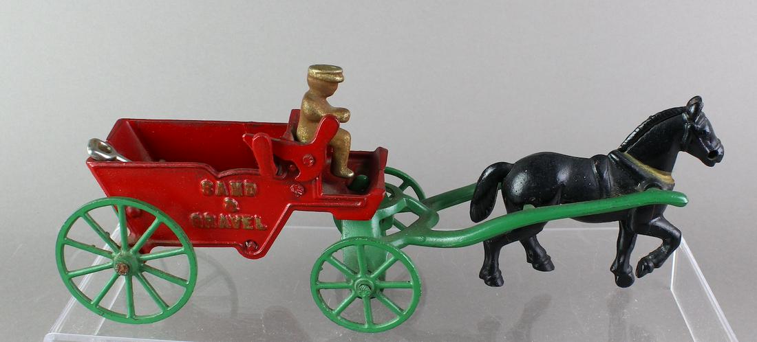 Kenton Sand & Gravel Wagon: Kenton cast iron Sand & Gravel horse drawn wagon. 10 1/2 inches long.