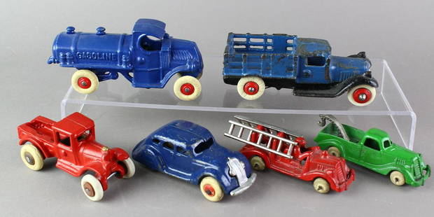 Arcade & Hubley Cast Iron Cars & Trucks: Cast iron work trucks and airflow car 3-5 inches, all repainted except take apart stake truck.