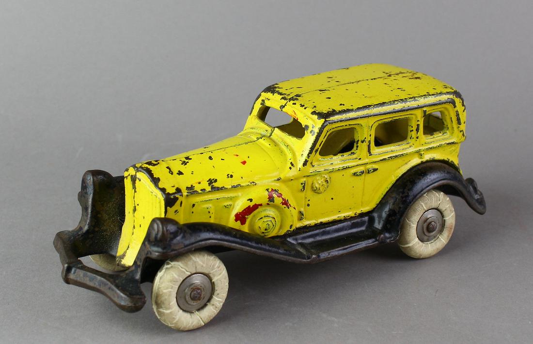 A C Williams large Cast Iron Sedan: William Cast Iron Sedan original paint, 7 inches.