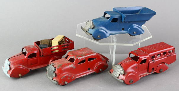 Marx Small Pressed Steel Trucks: 4 Marx Small trucks, dump truck repainted, 4 -5 inches long.