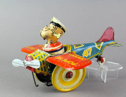 Marx Popeye the Pilot Airplane Tin Wind up: 1930s Marx Popeye the Pilot Airplane in fine original working condition.rn