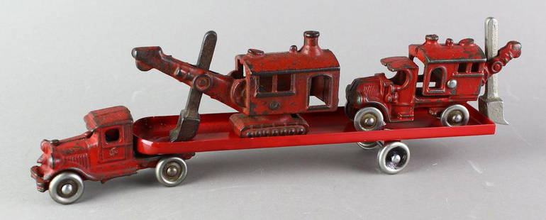 Cast Iron Steam Shovel  Crane Truck Transporter: A.C. Williams Truck cab auto transporter with 2 Steam Shovel construction cranes. Cranes may be Hubley or Dent, very nice shape 4 1/4 inches. Trailer is Eccles more contemporary. Very good looking dis