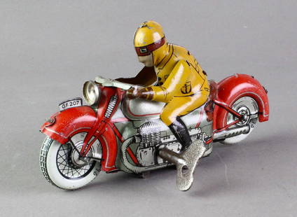 Fischer German Tin Motorcycle Racer: Georg Fischer German Tin Motorcycle Racer. U.S. Zone Germany motorcycle working wind up toy with key. Excellent 5 1/2 inches long.