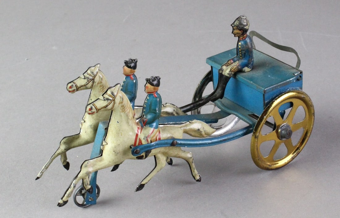 Early French Tin Soldiers and Caison Penny Toy: 1900s Pristine original tin penny or nickle toy of 2 soldiers on horseback and one on top of caisson or ammunition box. Beautiful detail and style to the tin most likely French. Approx 5 1/2 inches lo