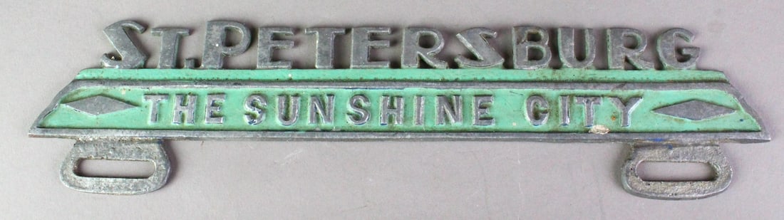 1930s Art Deco St. Petersburg FL License Plate Topper: 1930s Art Deco St. Petersburg Florida License Topper. Scarce metal auto license plate holder.