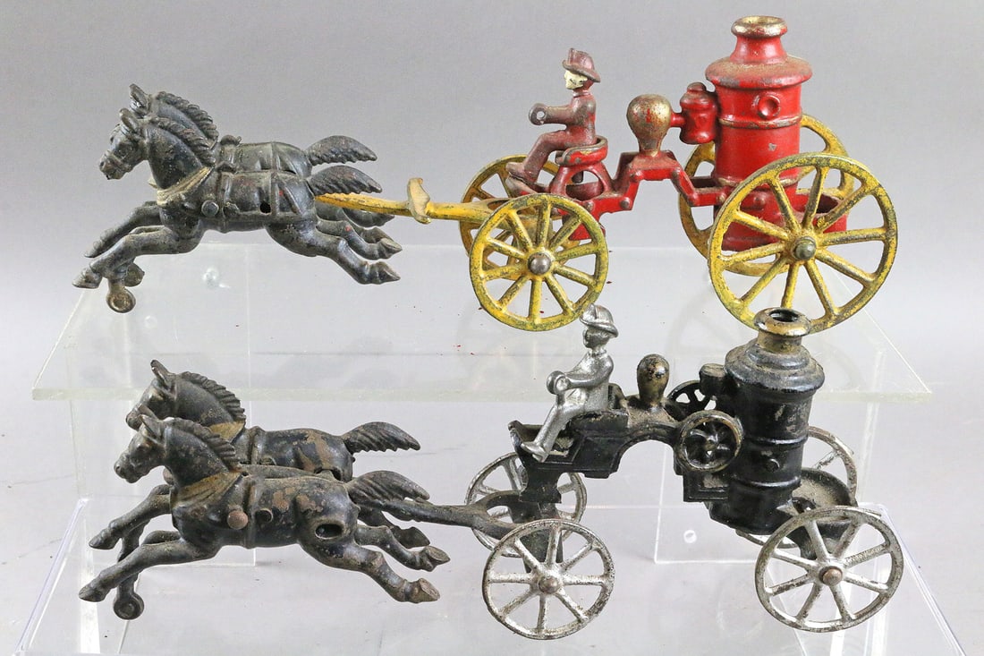 Two Cast Iron Horse Drawn Fire Pumpers: Cast Iron Fire Pumper Lot, 10, 12 inches.