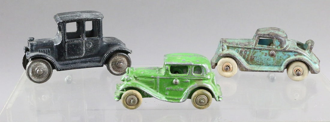Hubley & AC Williams Cast Iron Car Lot Including Austin: Hubley & AC Williams Cast Iron Coupe Lot 4, 5 inches including Williams Austin for the car carrier.