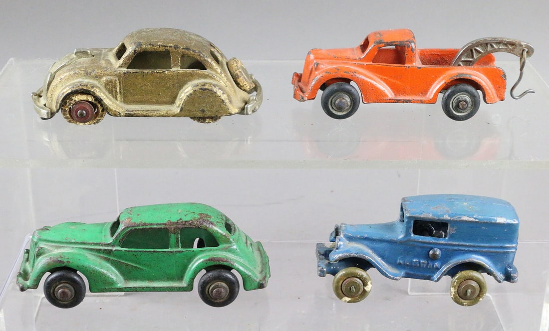Cast Iron Cars - Hubley, Arcade, AC Williams Austin: 4 Cast iron cars from Hubley, Arcade, and an AC Williams Austin Delivery truck.