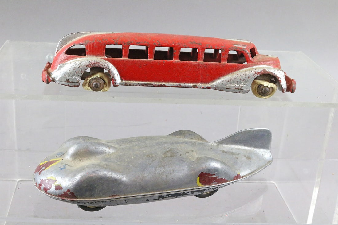Cast Iron Bus and Railton New Wonder Racer Lot: Cast Iron Bus and Racer Lot 8 inches. Streamlined race car apparently is the Railton New Wonder Car from the 1930s- Driven by John Cobb it achieved the land speed record of 369.74 mph on the Bonnevill