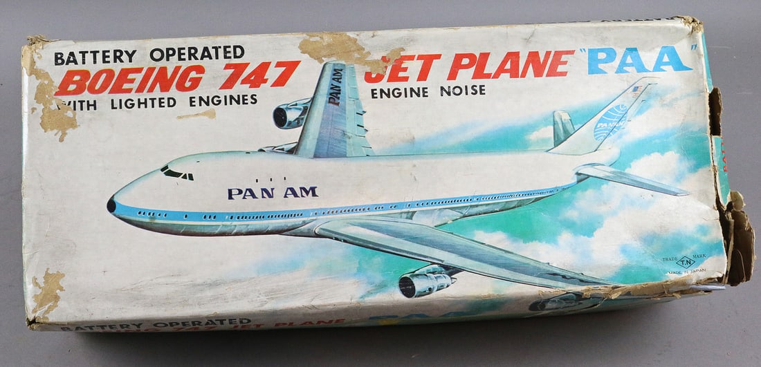 TN Japan Pan Am Boeing 747 Tin Litho Jet Plane In Box: TN Nomura Japan Pan Am Boeing 747 Tin Lithograph Battery operated Jet Airplane In Box 16 inches. Box has some tears and wear.