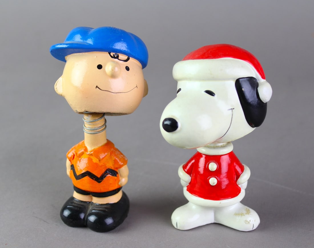 Peanuts Charlie Brown & Snoopy Nodders: Peanuts Charlie Brown & Snoopy Nodders, United Features Syndicate. Some hairline areas on Snoopy.
