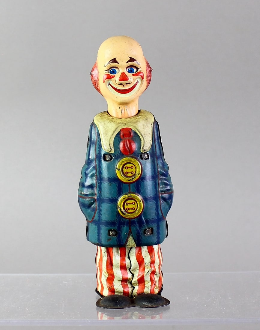 Distler German Tin Wind up Clown: Distler German Tin Wind up Clown, neck extends after winding.