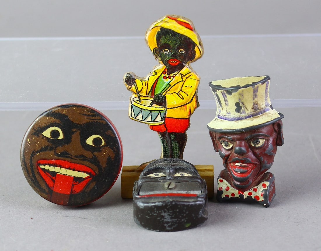 German Black Memorabilia & Pencil Sharpeners: German Black Memorabilia & Black Pencil Sharpeners. Tin appears French.