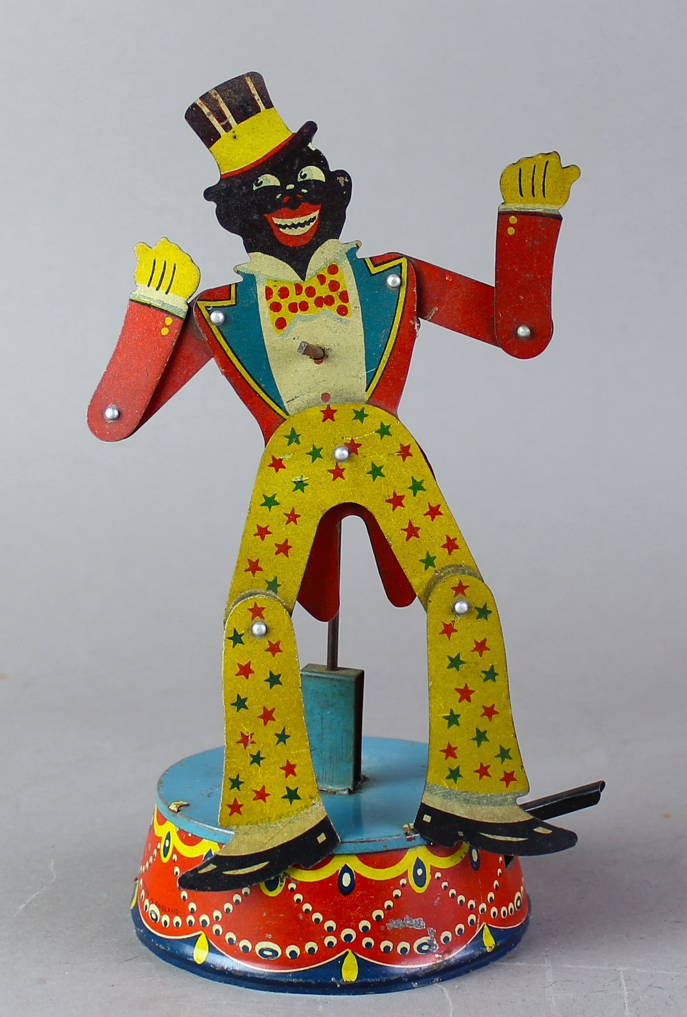 1930s German TIn Black Memorabilia Jazz Dancer Toy: 1930s German Tin Push Dancing Toy. Scarce working dancer toy with spririted action and bright strong litho. Update- 8 1/2 inches tall.