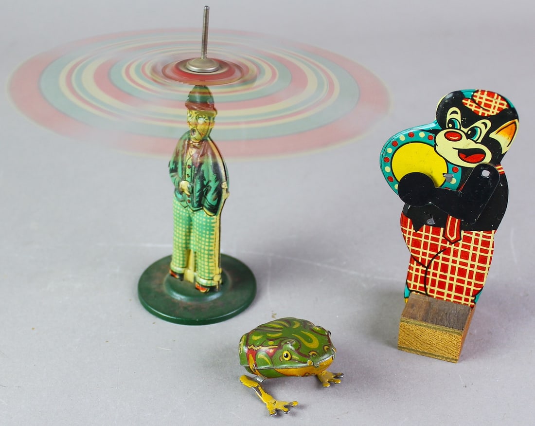 German Tin Penny & Nickel Toys: Tin Umbrella Man, Jumping Frog and Bear Clicker German tin toys.