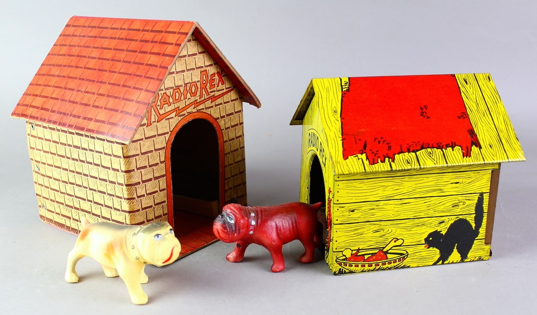 1930s Radio Rex Bulldog Doghouse Hugo & Elmwood: Pair of 1930s Radio Rex Bulldog Doghouses with Celluloid Bulldogs. One by John Hugo of New Haven CT and one by Elmwood Button Co. also of CT. Must have been a competitive hotbed of Radio Rex Productio