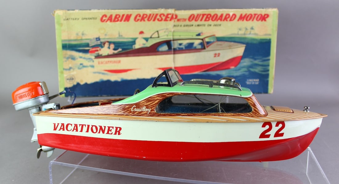 1950s Linemar Marx Cabin Cruiser & Outboard Motor in Box: Linemar Marx Cabin Cruiser Vacationer & Outboard Motor in Box. Marx Japan Tin Pristine Cabin Cruiser. Boat with the removable outboard Evinrude/Johnson style motor, battery operated tin toy. Bright bo