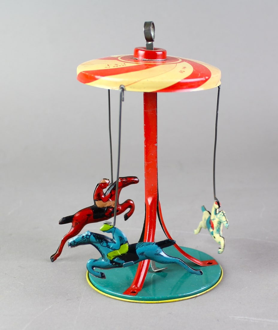 Buffalo Toys 3 Horse Carousel Tin Toy: Buffalo Toys 3 Horse Carousel Tin Toy. Push rod working excellent litho.
