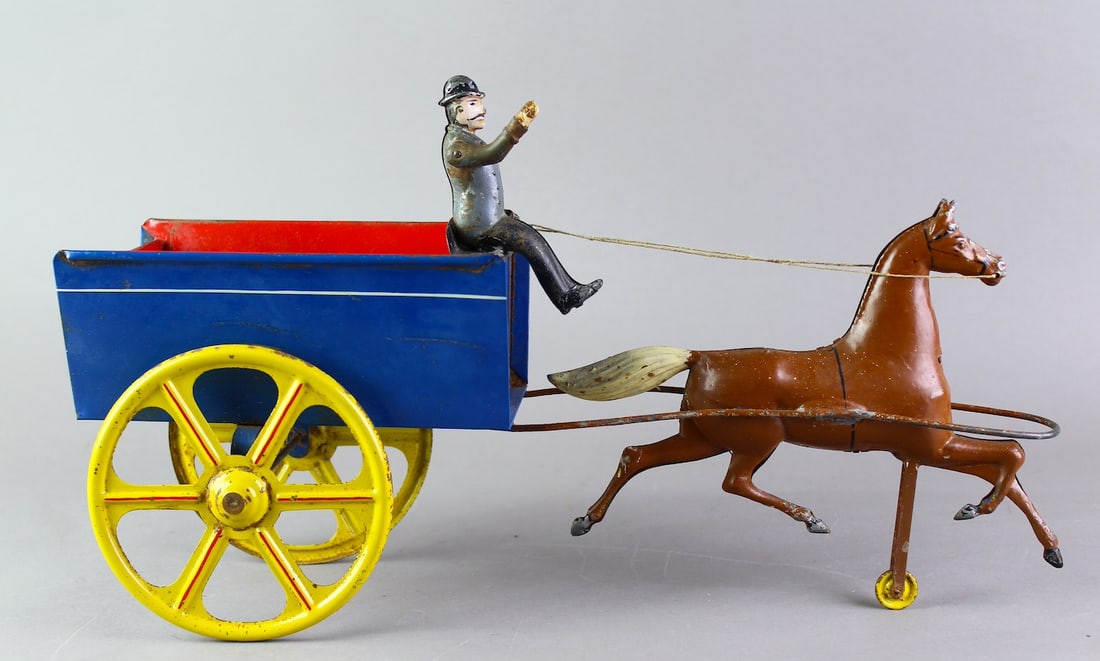 1900s Early Tin Horse & Wagon Sleek & Large: 1900s Early Tin Horse & Wagon. Beautiful proportioned horse & wagon with derby capped driver. Possibly French, excellent paint, over 16 inches long.