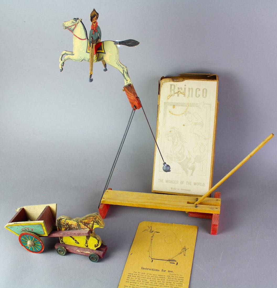 1900s German Brinco Circus Horse Balancing Toy Throws Rider in Box: Elaborate German Balance and Motion toy, Horse rocks then eventually throws rider onto pole. Wooden and metal in the the original Box. Brinco the Wonder of the World made in Germany, with City Dray li