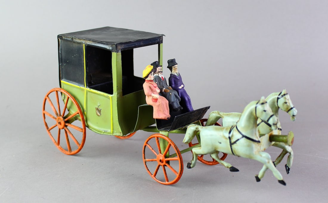 Fine French Tin Horse Drawn Landau Carriage w/Riders: 1900s French Tin Horse Drawn Landau Carriage w/Riders. Very well done painted carriage with 3 bisque riders. Sleek horsese, great paint. 12 inches long.