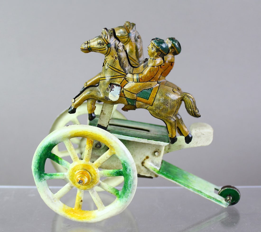 German Tin Horse Riders & Horses Wind Up: German Tin Horse Riders & Horses Wind Up. Kind of a Merry Go Round bobbing horse toy