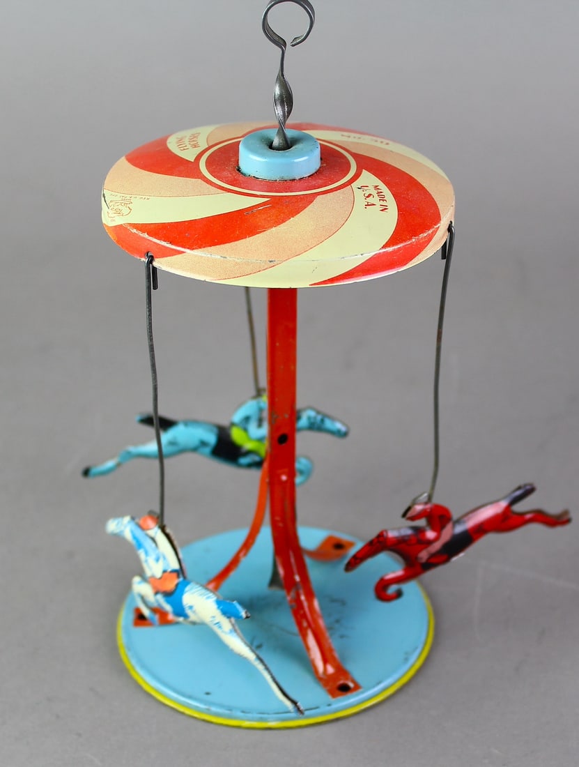 Buffalo Toys 3 Horse Carousel Tin Toy: Buffalo Toys 3 Horse Carousel Tin Toy. Spinning horses and riders by push pull top.