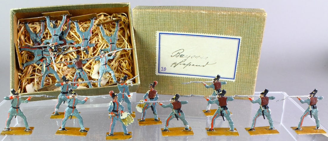 German Tin Soldier Flats Bavarian Army Bayern Boxed: German Tin Soldier Flats Bavarian Army Bayern Boxed. 20 hand painted infantry soldiers 40mm. Note: from a collection of German Tin soldier flats from the 1860s to 1920s. Most were never fully removed