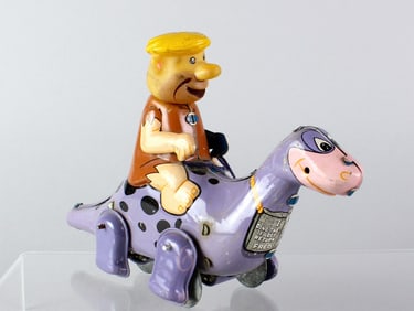 Linemar Japan Tin Flintstones Barny on Dinosaur