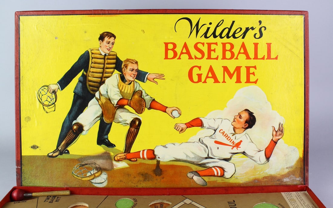 1920s Wilder’s Baseball Game in Box -Beauty: 1920s Wilder Baseball Game in Box. Great Graphic game showing St. Louis Cardinal's player sliding into home plate. Game is in excellent original condition with the metal player markers and playing fie