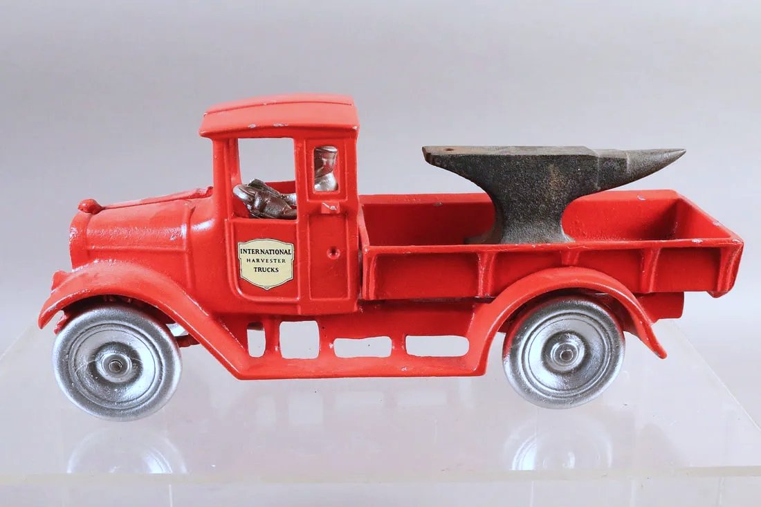Arcade Red Baby Dump Truck Cast Iron w Anvil (1 of 2)