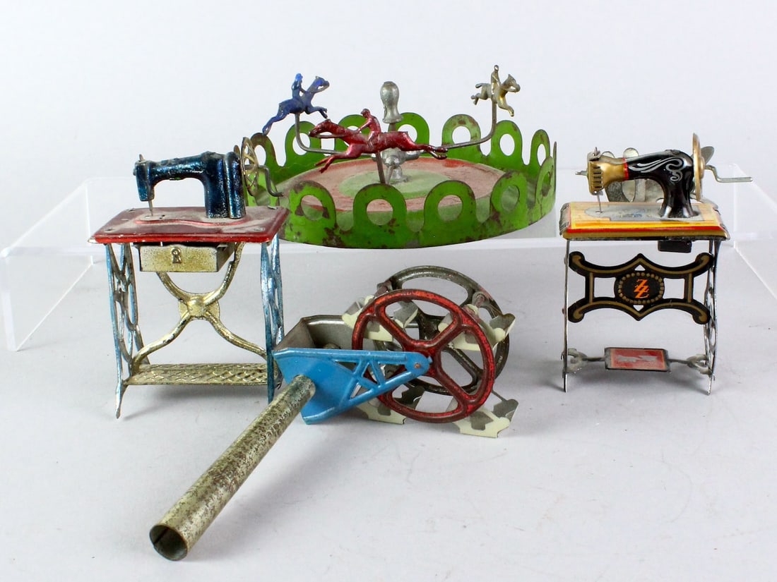 Four German Tin Penny Toys (1 of 4)