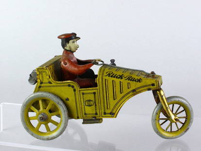 German Greppert & Kelch Ruck Ruck Tin Windup Car: German Greppert & Kelch Ruck Ruck Tin Windup Car. G&K working wind up, nice litho missing one front headlight tab., 6 inches long.