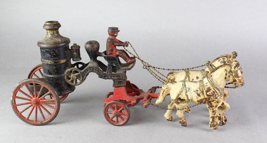 1900s Cast Iron Fire Pumper & Horses: 1900s Cast Iron Fire Pumper & Horses, 16 inches long.