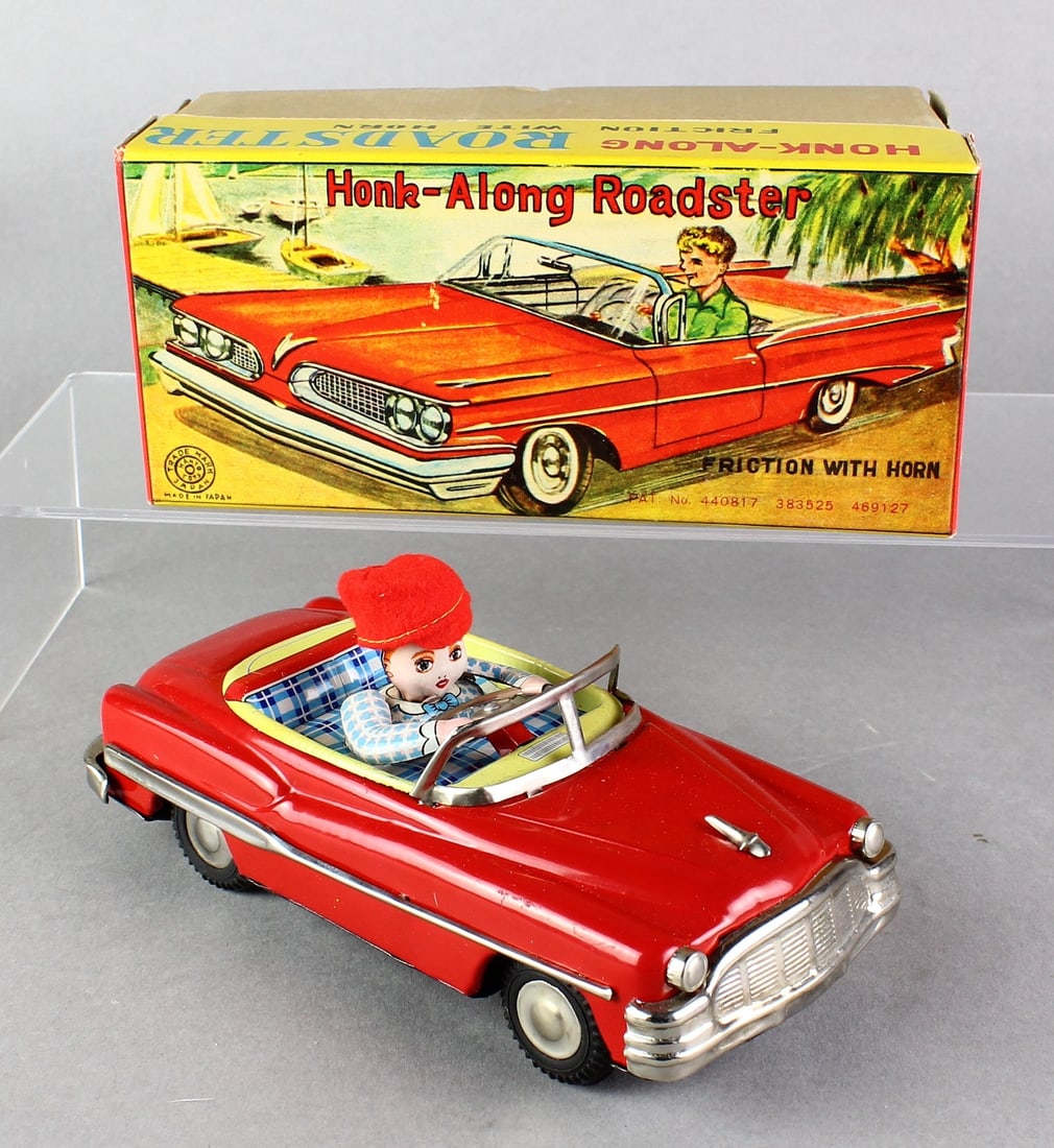 Japan Tin Honk A-Long Roadster Car Mint in Box: Japan Tin Honk A-Long Roadster Car Mint in Box. Friction working with honking sound as friction runs. Great working car 7 1/2 inches in crisp box.