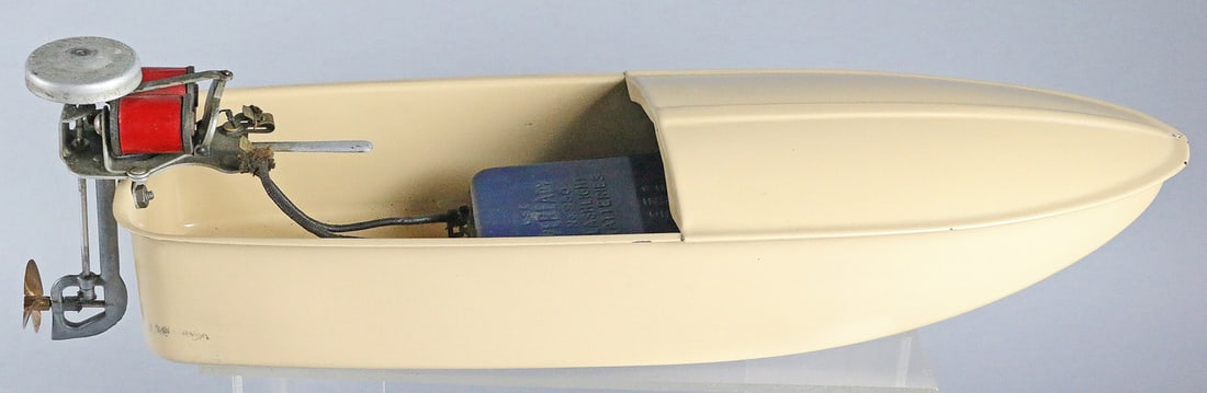 La Page Outboard Motorboat: La Page Outboard Motorboat, early marked LA Page, pressed steel, 21 inches, body of boat restored, engine and battery case original paint. Rare